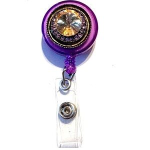 Retractable badge holder